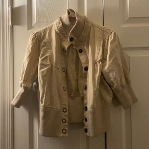 Tan bomber jacket with snap closing